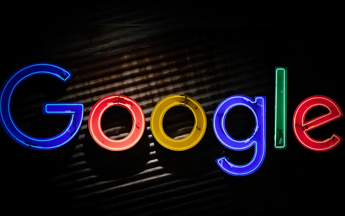 Google sign glowing in neon lights
