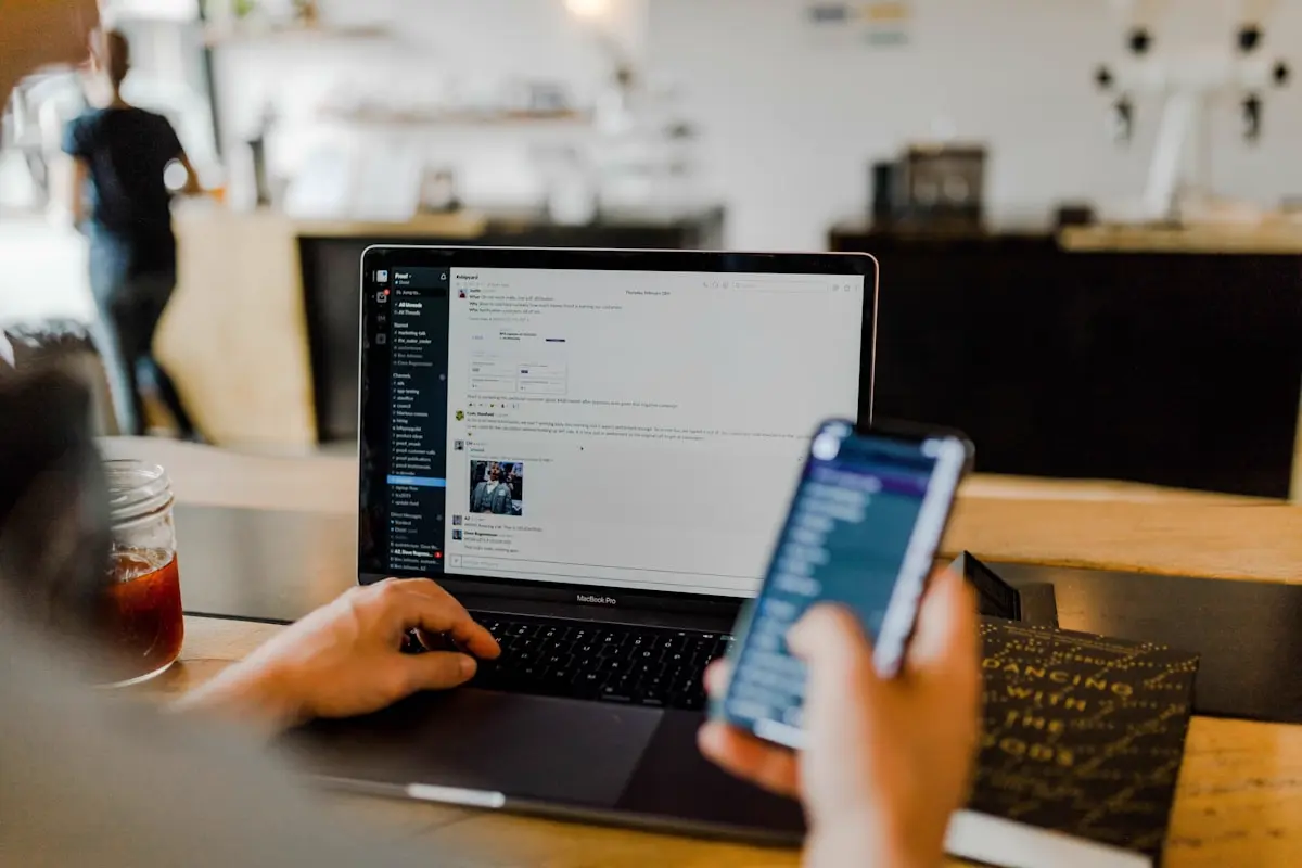 Laptop workspace in a cafe for social media management