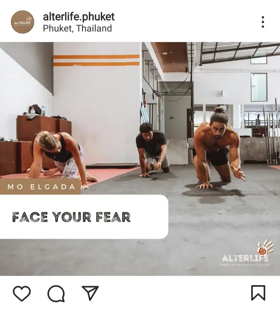 Face Your Fear Instagram post — coach Mo Elgada leading a bear-crawl session