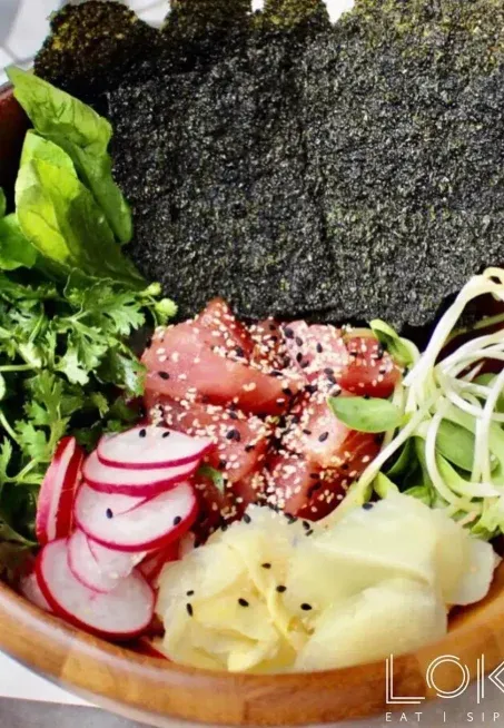 Tuna poke bowl with seaweed, radish and ginger