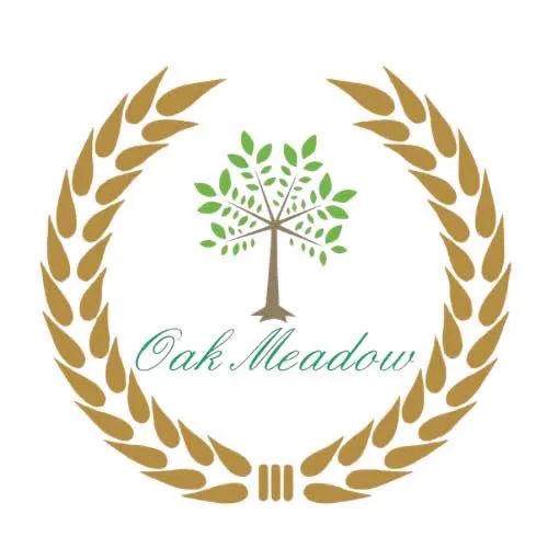 Oak Meadow brand tile with laurel wreath and tree logo