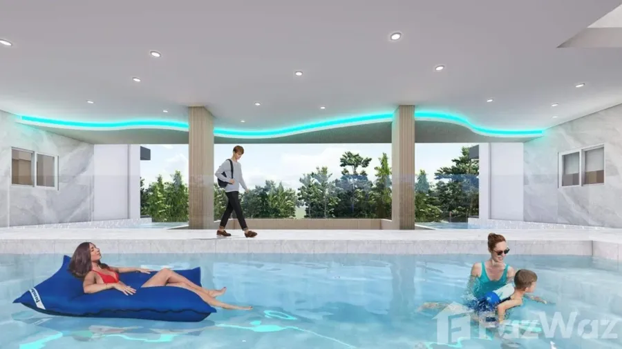 Indoor pool render — floating loungers under teal LED lighting
