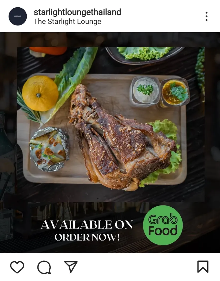 Pork knuckle with baked potato — available on GrabFood